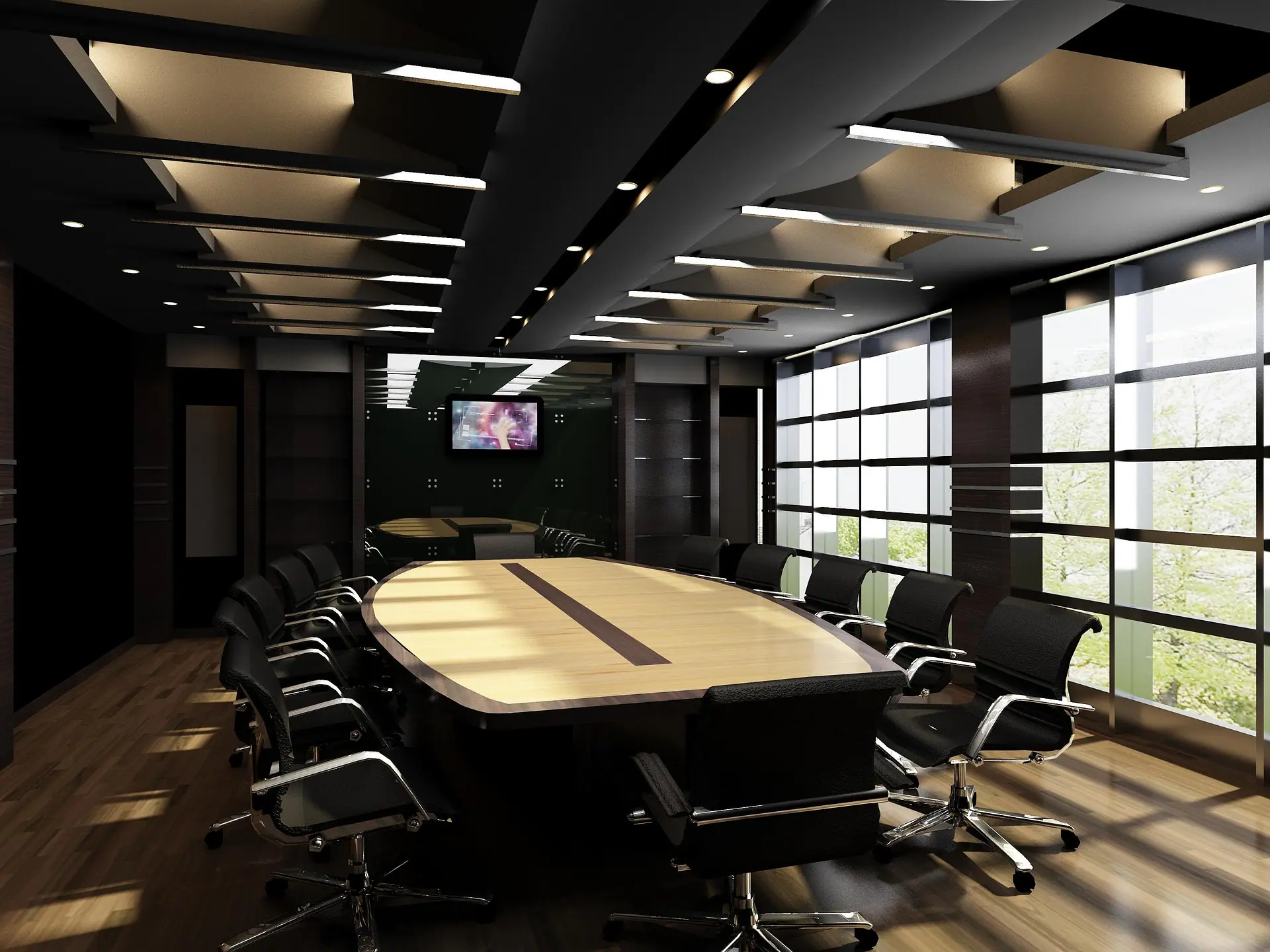 Hybrid conference centre with a long table and a black ceiling