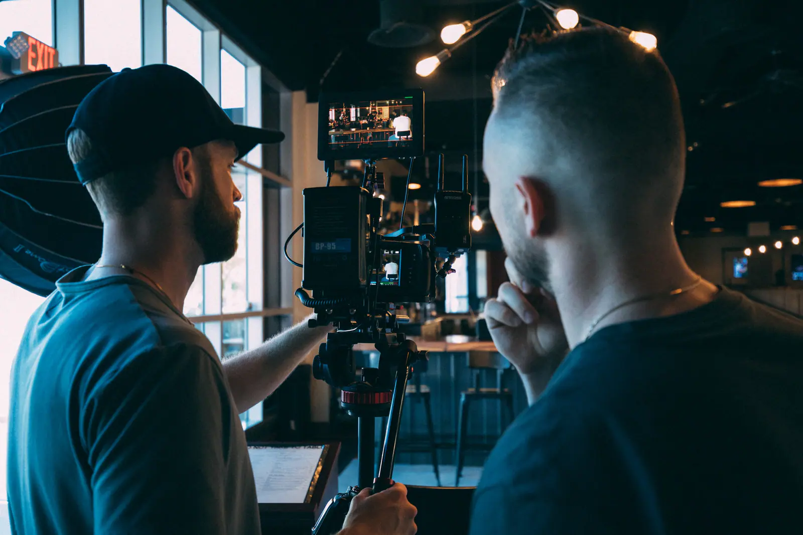 Film crew operating a cinema camera on set
